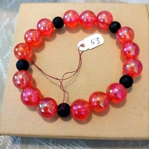 Artemis's Gems custom-made beaded bracelet with red and black beads